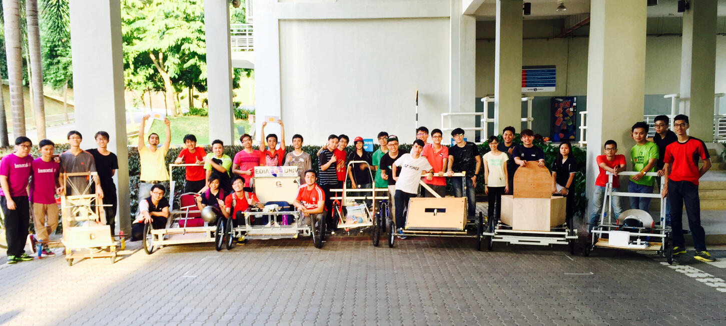 Group photo of all the teams and their designed soap box gravity car.